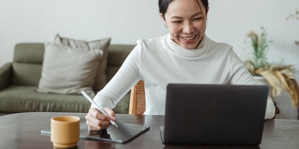 Female-businesswoman-working-from-home-staying-safe-and-well